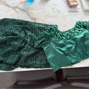 Elegant Green Dress with Intricate cross blouse with saree . Ready made blouse.
